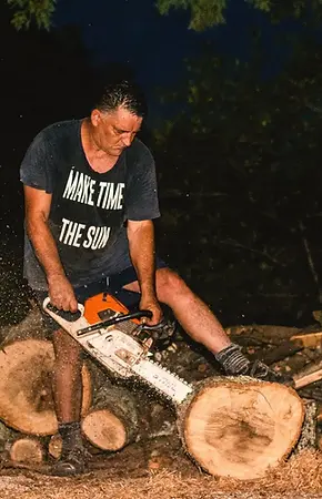 Arborist climbing a tall tree